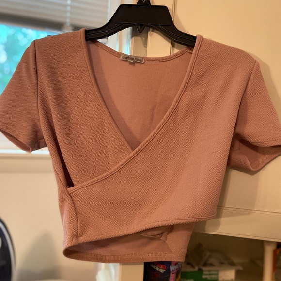 Charlotte Russe Tops - a creme cropped shirt